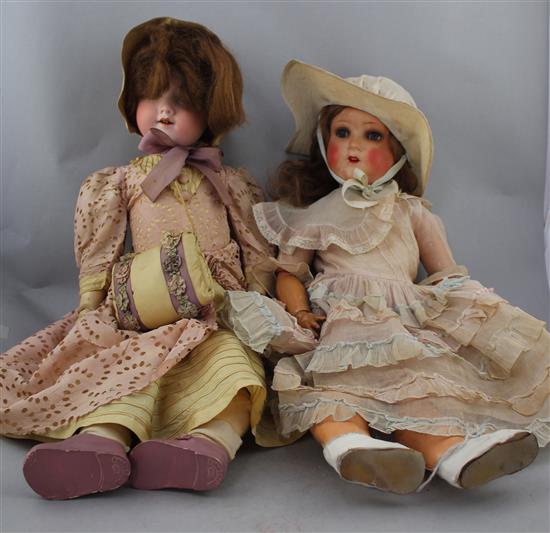 An Armand Marseille bisque headed doll & another doll